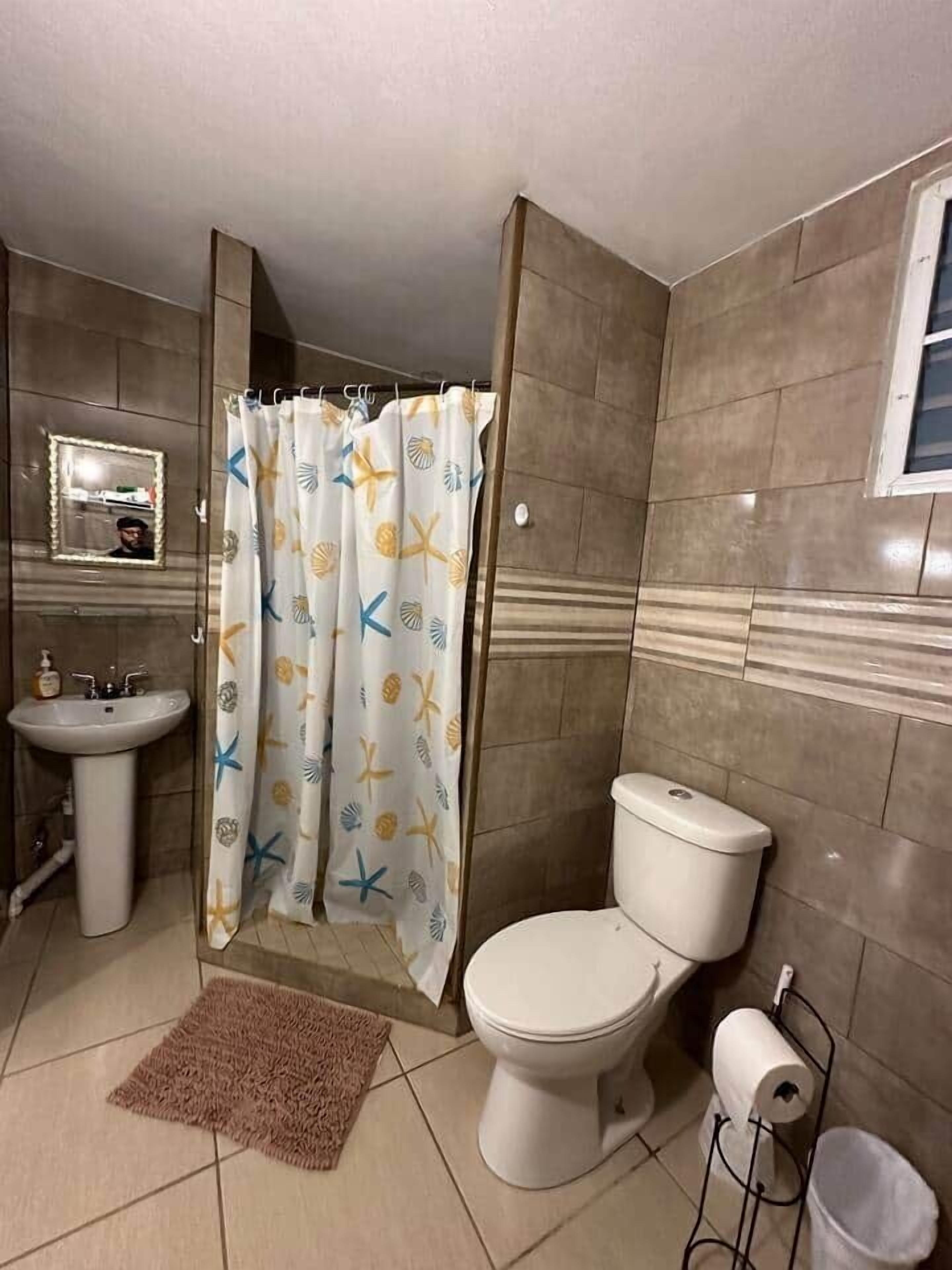 Shower, hair dryer, soap, shampoo