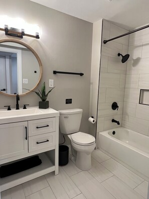 Hair dryer, towels, soap, shampoo