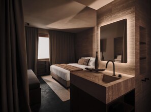 Literie hypoallergénique, minibar, coffres-forts dans les chambres