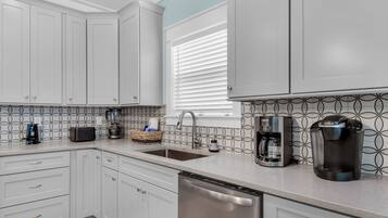 House, Multiple Beds, Patio, Garden View (Boat & Beach) | Private kitchen | Dining tables