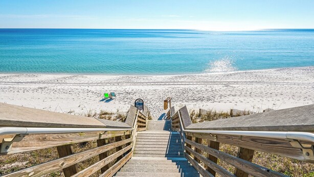 A wooden staircase leading to a beach with a clear view of the ocean. - Pet Friendly on Canal in Old Seagrove - Next to Seaside & 3 Blocks to Beach! (Santa Rosa Beach)