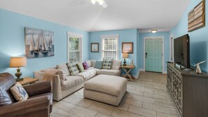 Maison, plusieurs lits, patio, vue jardin (Sandy Teauxs) | Coin séjour