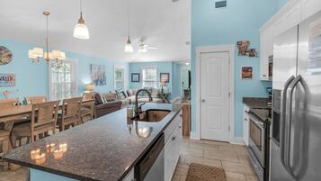 House, Multiple Beds, Patio, Garden View (Sandy Teauxs) | Private kitchen | Dining tables