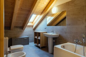 Shower, eco-friendly toiletries, hair dryer, bidet