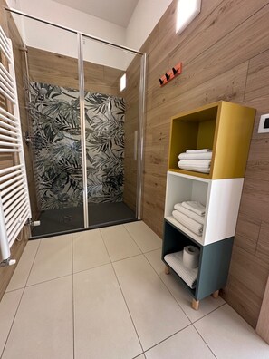 Eco-friendly toiletries, hair dryer, towels