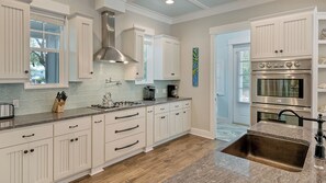 House, Multiple Beds, Pool Access, Ocean View (Blue Bungalow) | Private kitchen | Coffee/tea maker