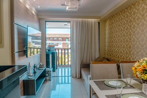 Apartament familiar | Sala d'estar | Televisor de pantalla plana 