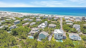 A coastal residential area with houses, a beach, and a clear blue sky. - Private Pool in Grayton Beach; 3 Minutes to Beach & Sleeps 14 (Santa Rosa Beach)