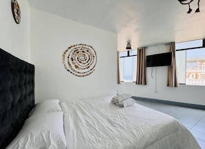 Deluxe kamer, uitzicht op het strand | Gratis wifi