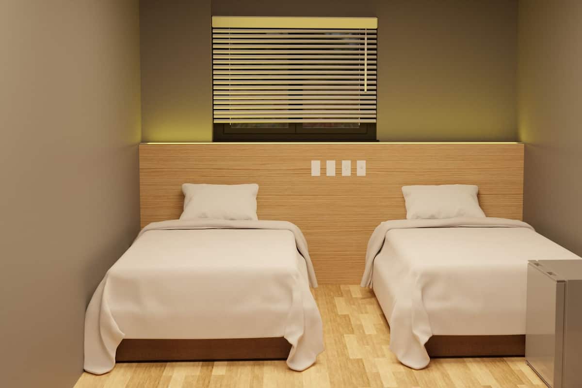 Klassieke Twin kamer, 2 eenpersoonsbedden, niet-roken, privébadkamer | Een bureau, een laptopwerkplek, geluiddichte muren, gratis wifi