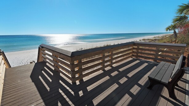 A wooden deck with a bench overlooking a beach. - Spacious 4BR With 2 Master Suites, Golf Cart, .3 Miles to Beach - Sleeps 15 (Santa Rosa Beach)
