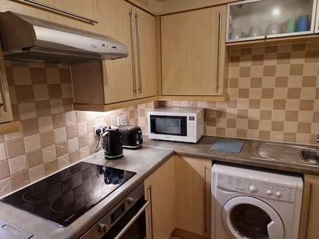 Refrigerador, microondas, horno, placa de cocina