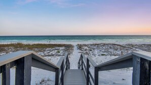 A wooden staircase leading to a beach with a view of the ocean. - Stunning Views! 9BR Gulf Front Home, Pool, Elevator, Pool Table (Destin)