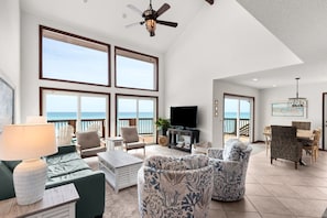 House, Multiple Beds, Patio, Ocean View (Sun 'n Surf) | Living area | Fireplace, MP3 dock - Gulf Front: Steps to Beach ~ Minutes to Rosemary ~ Free Beach Setup! (Panama City Beach)