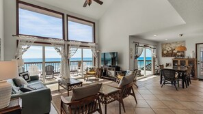 House, Multiple Beds, Patio, Ocean View (Sun 'n Surf) | Living area | Fireplace, MP3 dock - Gulf Front: Steps to Beach ~ Minutes to Rosemary ~ Free Beach Setup! (Panama City Beach)