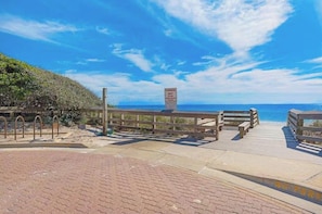 A wooden boardwalk leading to a beach with a sign indicating a no-parking zone. - Coastal Getaway - Beach, Pool, Golf Cart, Seagrove Beach! (Santa Rosa Beach)