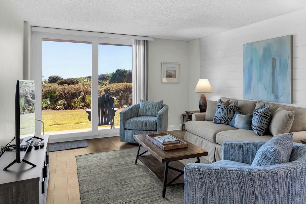 Condo, Multiple Beds, Balcony, Garden View (BeachCrest 103) | Living area | 42-inch flat-screen TV with digital channels