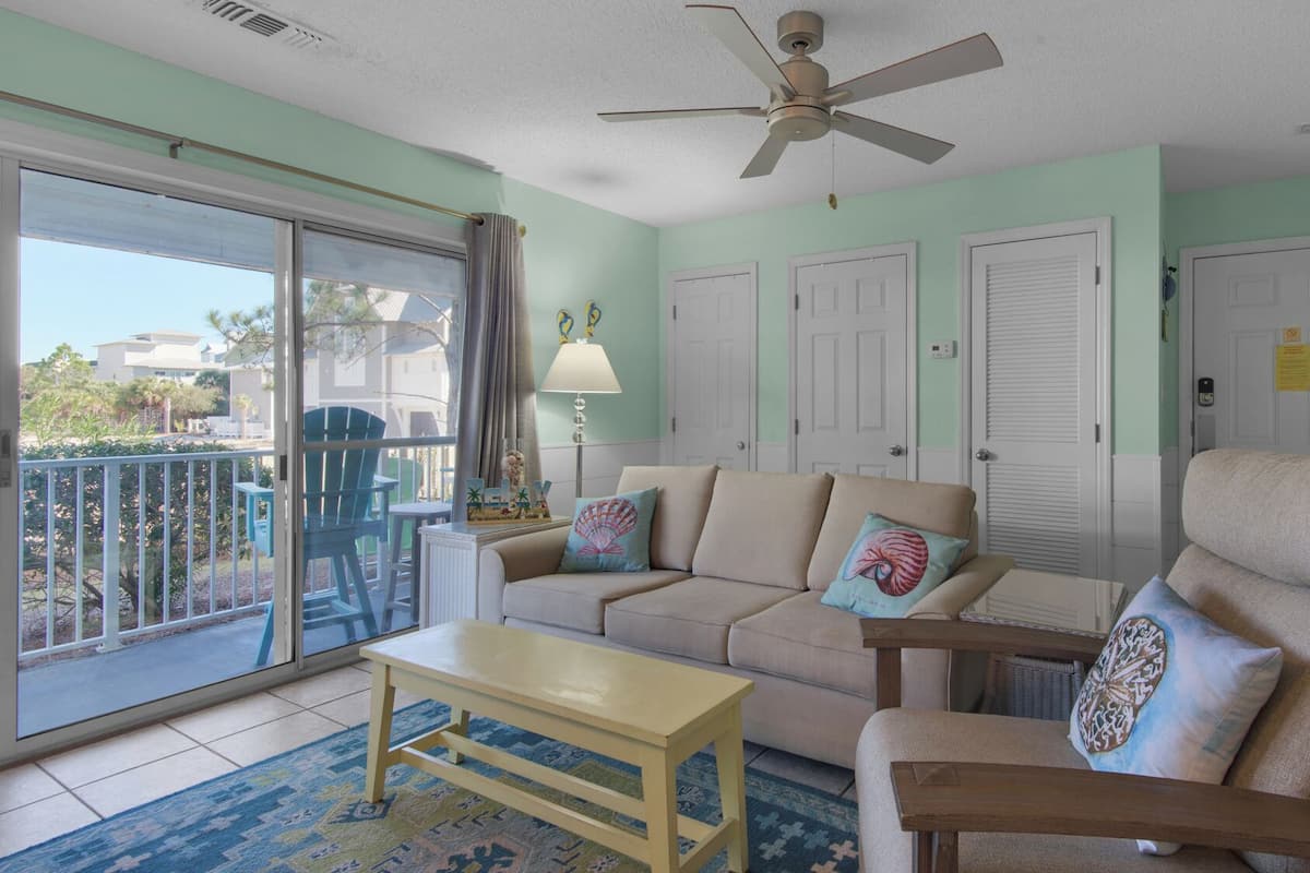 Condo, Multiple Beds, Patio, Garden View (Beachside Villas 714) | Living area | 42-inch flat-screen TV with digital channels