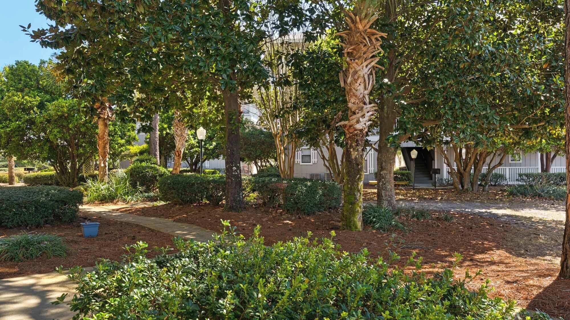 Leilighet, flere senger, terrasse, hageutsikt (Beachwood Villas 13A) | Overnattingsstedets uteområder