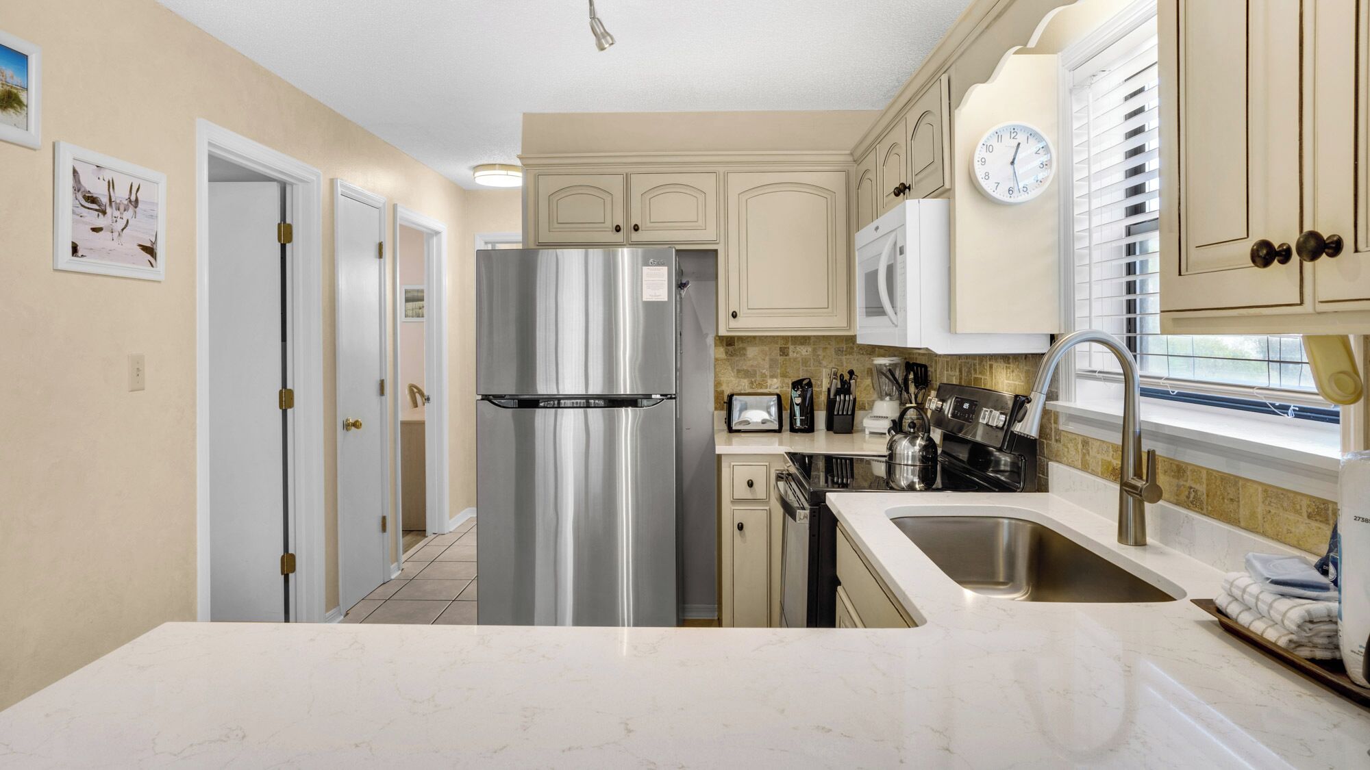 コンドミニアム ベッド (複数台) パティオ ガーデンビュー (Beachwood Villas 13H) | 専用キッチン | ダイニングテーブル