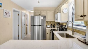 Condo, Multiple Beds, Patio, Garden View (Beachwood Villas 13H) | Private kitchen | Dining tables - Beachwood Villas (Santa Rosa Beach)