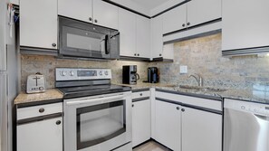 Condo, 1 King Bed with Sofa bed, Patio, Ocean View (Dune Villas 5A) | Private kitchen | Coffee/tea maker, dining tables - Dune Villas (Santa Rosa Beach)