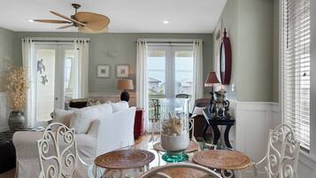 Condo, 1 King Bed with Sofa bed, Balcony, Garden View (Grand Isle 304) | Living area | 42-inch flat-screen TV with digital channels