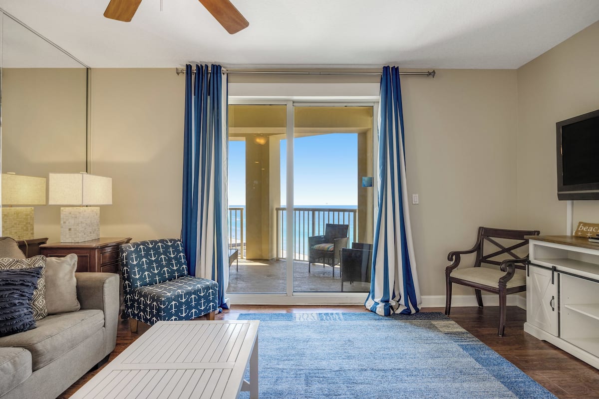 Condo, Multiple Beds, Balcony, Ocean View (Grand Panama 2-1002) | Living area | 42-inch flat-screen TV with digital channels