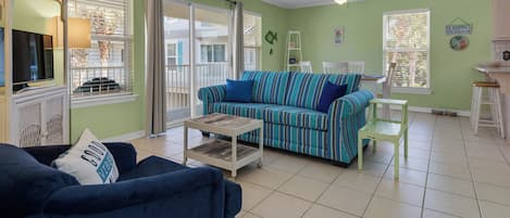 Condo, 1 Queen Bed with Sofa bed, Balcony, Pool View (Rollin Tide C8) | Living area | 42-inch flat-screen TV with digital channels