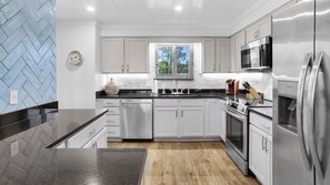 Condo, Multiple Beds, Patio, Partial Ocean View (Sand Cliffs 106) | Private kitchen | Coffee/tea maker