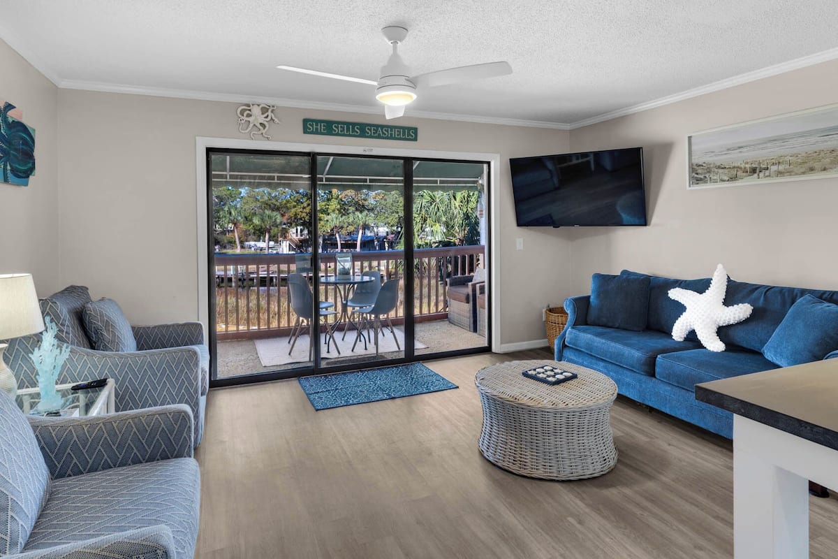 House, Multiple Beds, Balcony (St Thomas Square 109 - No Pets) | Living area | 42-inch flat-screen TV with digital channels