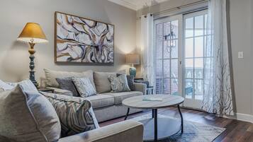 Condo, Multiple Beds, Balcony, Garden View (Village of South Walton 314D) | Living area | 42-inch flat-screen TV with digital channels