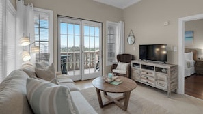 Condo, várias camas, sacada, vista para o jardim (Village of S Walton 311F) | Área de estar | TV de tela plana 42 polegadas com canais digitais