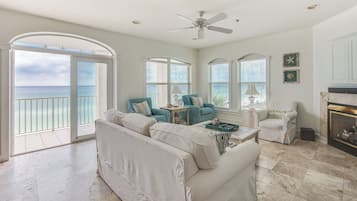 Condo, Multiple Beds, Balcony, Ocean View (Villas At Sunset Beach A302) | Living area | 42-inch flat-screen TV with digital channels