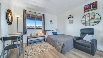 Suite, balcón | Wifi gratis y ropa de cama