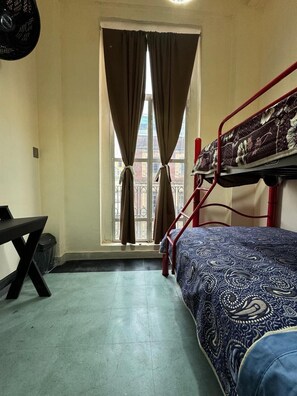 Desk, free WiFi, bed sheets