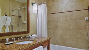 A bathroom with a granite countertop, a white sink, a mirror, a shower with a glass door, and a towel rack. - The Westin Riverfront Mountain Villas, Beaver Creek Mountain Studio
 (Avon)