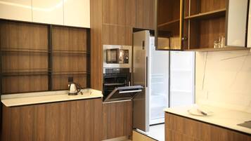 Apartment | Private kitchen | Fridge, microwave, oven, stovetop