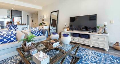 Waterfront condo with marina views near promenade
