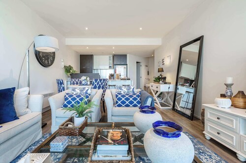 Waterfront condo with marina views near promenade