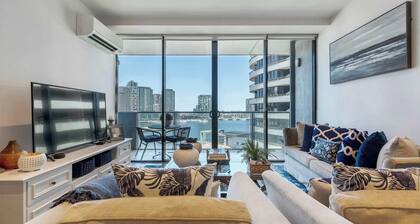 Waterfront condo with marina views near promenade