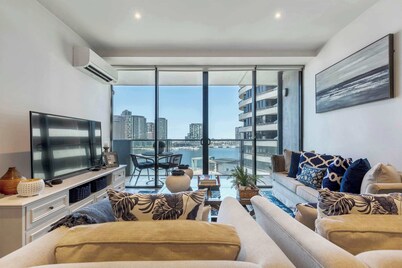 Waterfront condo with marina views near promenade