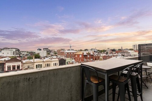 Sunrise rooftop views above eclectic Fitzroy