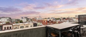 Sunrise rooftop views above eclectic Fitzroy