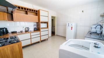 Fridge, microwave, cookware/dishes/utensils