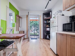 Fridge, microwave, cookware/dishes/utensils