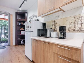Fridge, microwave, cookware/dishes/utensils