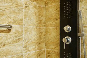 Shower, hair dryer, towels
