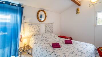 2 dormitorios, tabla de planchar con plancha, wifi gratis y ropa de cama