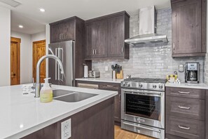 Microwave, oven, stovetop, dishwasher - Spring Creek Vacations 1 BR Condo 108TM (Canmore)